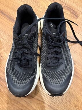 Women's Black Athletic Running Shoes with Cushioned White Midsole